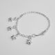 PULSERA CASANDRA CON DIJE DE ESTRELLA DE NIÑO  DIAMANTADA