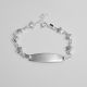 PULSERA CON PLACA DE FLOR Y DE ESTRELLA DE NIÑO