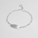 PULSERA CON PLACA DE NIÑO