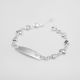 PULSERA CON PLACA DE CORAZÓN DE NIÑO