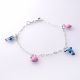 PULSERA DELFÍN DE CORAZÓN DE NIÑO  ESMALTADA